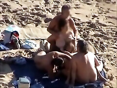 Group mom ripped doggy at a nudist beach