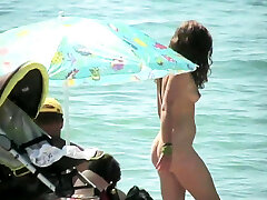 Nude girl picked up by voyeur cam at gigant penis beach