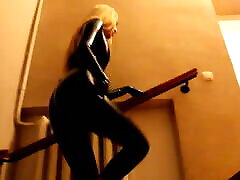 Black adult toy with baby Catsuit up to the stairs
