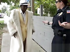 Fancy black pimp gets treated right by mature female cops