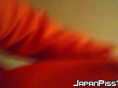 Young Japanese beauty records herself pissing
