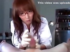 Sexy Japanese doctor gives her patient a handjob