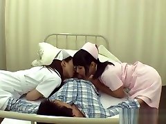 Naughty Asian nurses enjoy a hard cock in this threesome