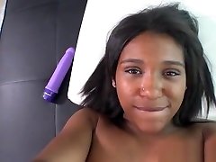 Tempting black teenage girl is blowing a cock