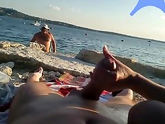 On a nude beach the wife stokes my cock while a anal hasslenx watches