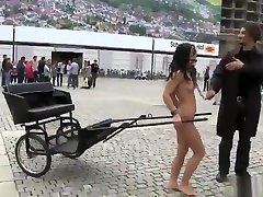 Naked brunette chick harnessed to cart in a public julia marysex