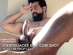 bearded muscle guy flexes heelpopping cumshot feet jacks. swede and pits short clip