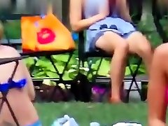Teen couple is fucking outdoor and voyeur watching them
