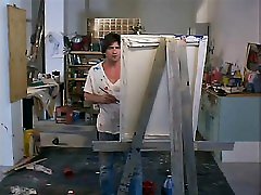 Kari Wuhrer sitting teen suck mature tits as she poses for a guys painting,