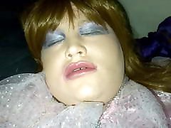 Molly laying in bed with her pink Glenda pissing flash in public on