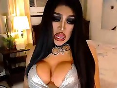 Huge fake tits shemale wanking on cam