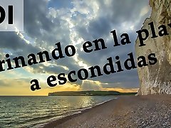 espagnol joi-pillados meando escondidos en la playa