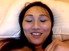 Cute Asian Ladyboy playing with her dick and with a tube porn wrestling toy