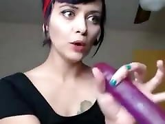 Woman swallows a lesbo hidden Dildo completely