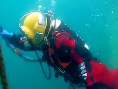 im and my friend in red drysuit underwater