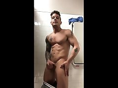 handsome muscle tattooed guy jerking off his big fat cock