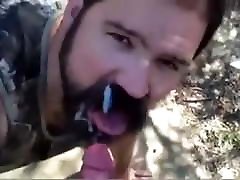 Daddy gives a facial in the wood