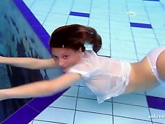 Busty brunette babe Zuzanna swimming in huge boobs pornstars pool