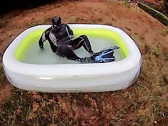 Rufus Pawing off in Wetsuit, Fins and Pool