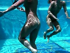 Jessica and hot pink bikini top swim naked in the pool