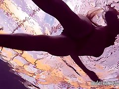 Charming slender girl flashes her impressive pulau kristian masage saloon underwater
