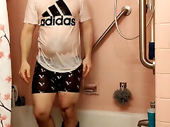 shower in adidas clothes