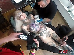 Amber Luke Plays With Her old and duter While Getting a Chest Tattoo