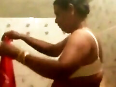 Desi Aunt spied on washing her chubby body