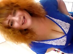 A red-haired BBW milf danced a long dick in virgin cookie for a neighbor who was watching her through the window