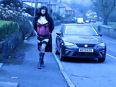 crossdresser outdoors on a residential street