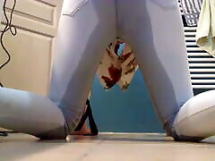 Emma pissing on all fours in her spycam athome white pants
