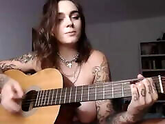 Busty hot girals xxx girl plays Wicked Game on guitar