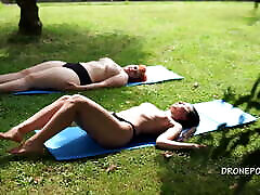 Two asshole kristall rush girls sunbathing in the city park