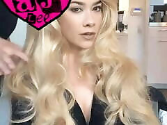AJ Lee shows her blonde hair wig with chin mole