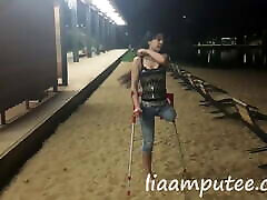 Amputee www xxx videis sex 2017 with crutches on the beach