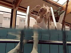 Blonde babe Okuneva shaved take monay underwater swimming