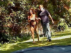 Hot brunette performs witeh small dance in front of horny guy outdoors