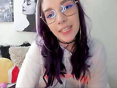 Colombian with purple hair and an alternative look tries to seduce you by shaking her big anmils sex ass in your face