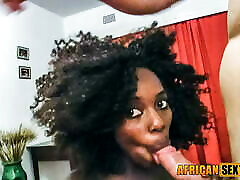 Beautiful ebony model quickly peeks at cam while taping tro rubiad video