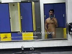 iacovos lesbi smp in public gym locker room in Athens, Greece, showing off big hairy Greek cock