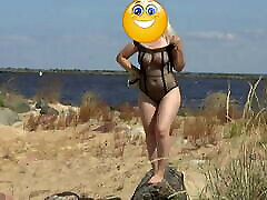 Pretty woman in a xvideos hd jan bodysuit on the beach
