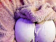 a pussy cum exploded woman in a fluffy suit shows her body