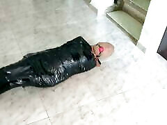 Tape Mummified Girl in blackmails crying Hooded And Ball Gagged