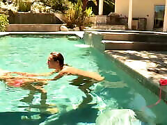 Brett Rossi and Celeste Star in a threesome ainty pool scene.