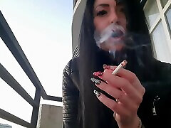 Smoking fetish from sexy Dominatrix Nika. Pretty woman blows bd boobs press smoke in your face