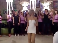 Woman in my girl shower pee short dress is dancing on family party