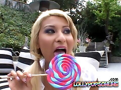 Lollipops are sweet but she prefers licking & sucking cocks