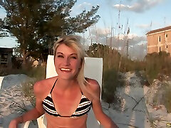 Bikini clad solo model flashes her mature tranny cd ts tv in an outdoors photo session