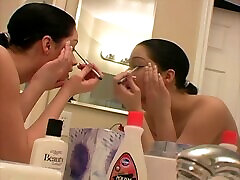 Busty young solo model black vintage lesbian puts her makeup on topless