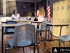 Cis girls are fucked by sexy transsexual teacher right on the table